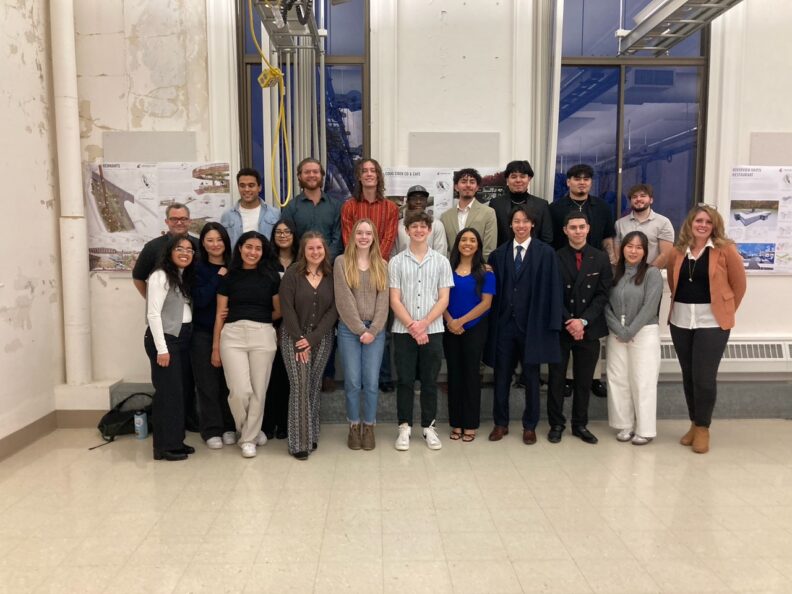 Seniors with faculty Kate Kraszewska and Dan Cronan.