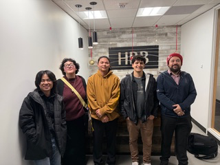 Five students posing for a photo.