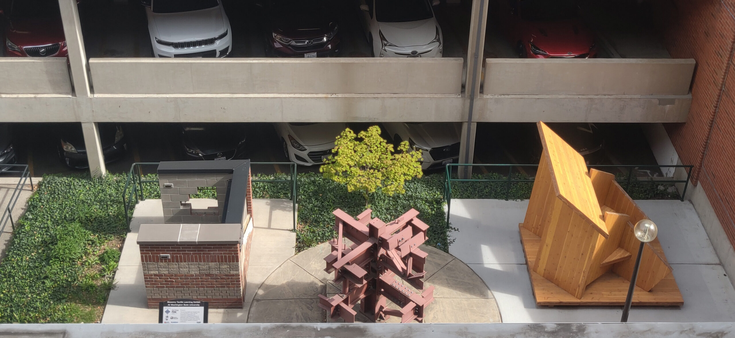 Learning Corridor from the view of the fourth floor of carpenter hall. the corridor features three abstract architectural sculptures.