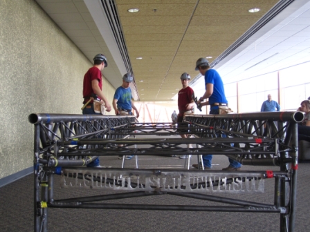 Washington State University Steel Bridge Team working on a bridge.