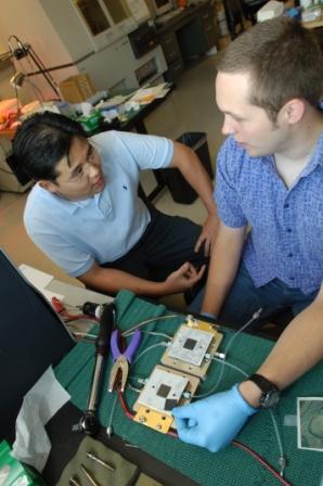 Professor Su Ha with student Jerry Oelerich working to develop novel and efficient catalysts to make energy-efficient fuels cells more viable.