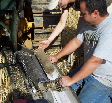 David Uberuaga taking a soil core for carbon, nitrogen, and sulfur analysis, which will later be used for incubation testing for carbon mineralization.