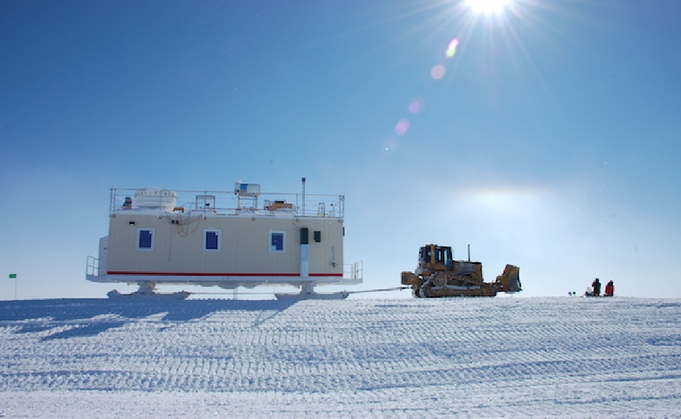 Professor Von P. Walden and team moving research equipment in Greenland.