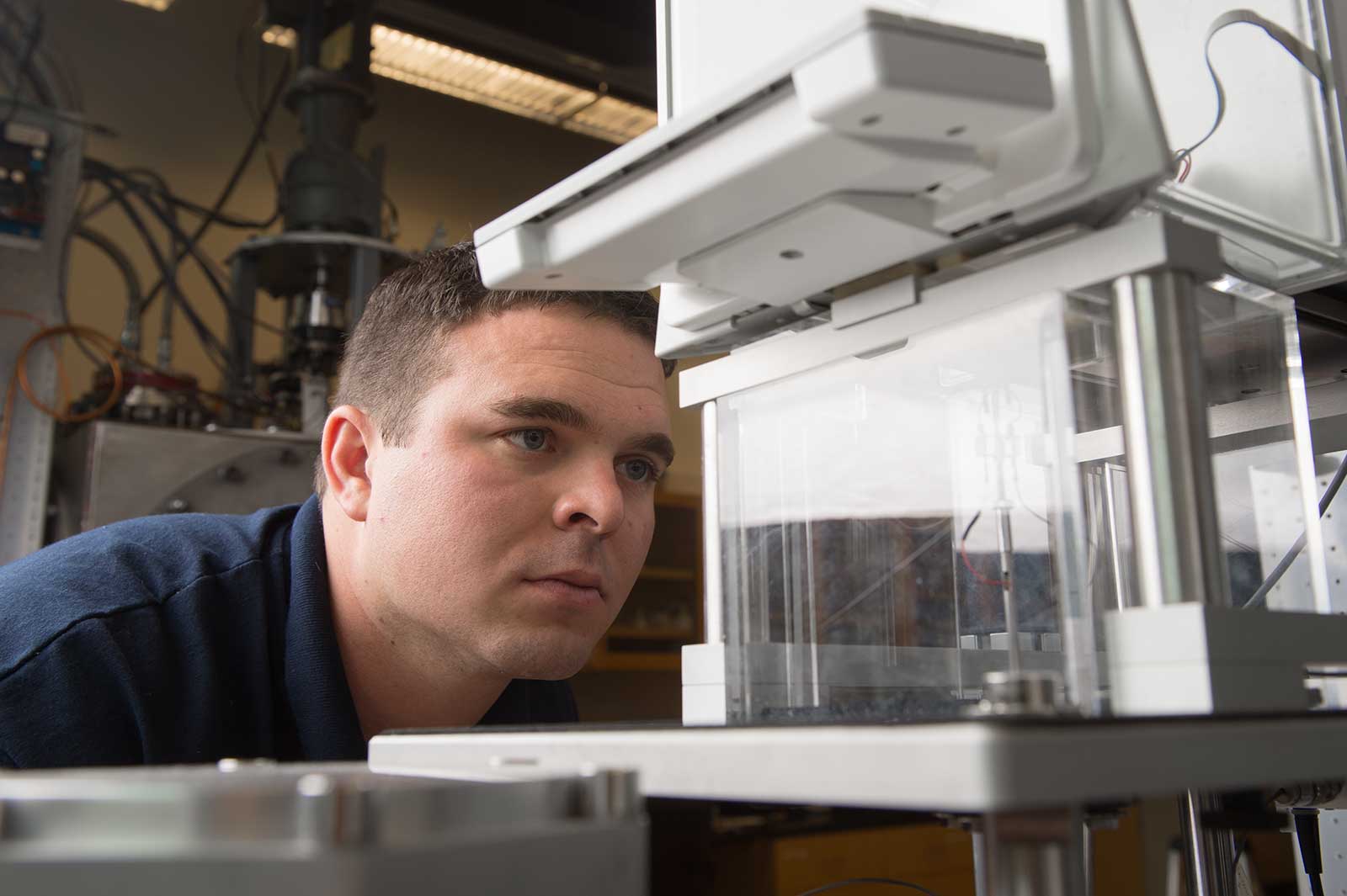 Ian Richardson checking equipment in the HYPER lab.