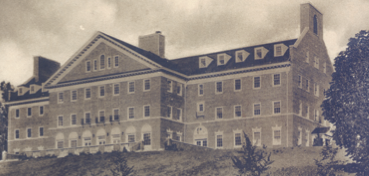 Four-story brick building.