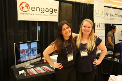 Emily Willard and Katherine Brandenstein pose in front of their competition display.