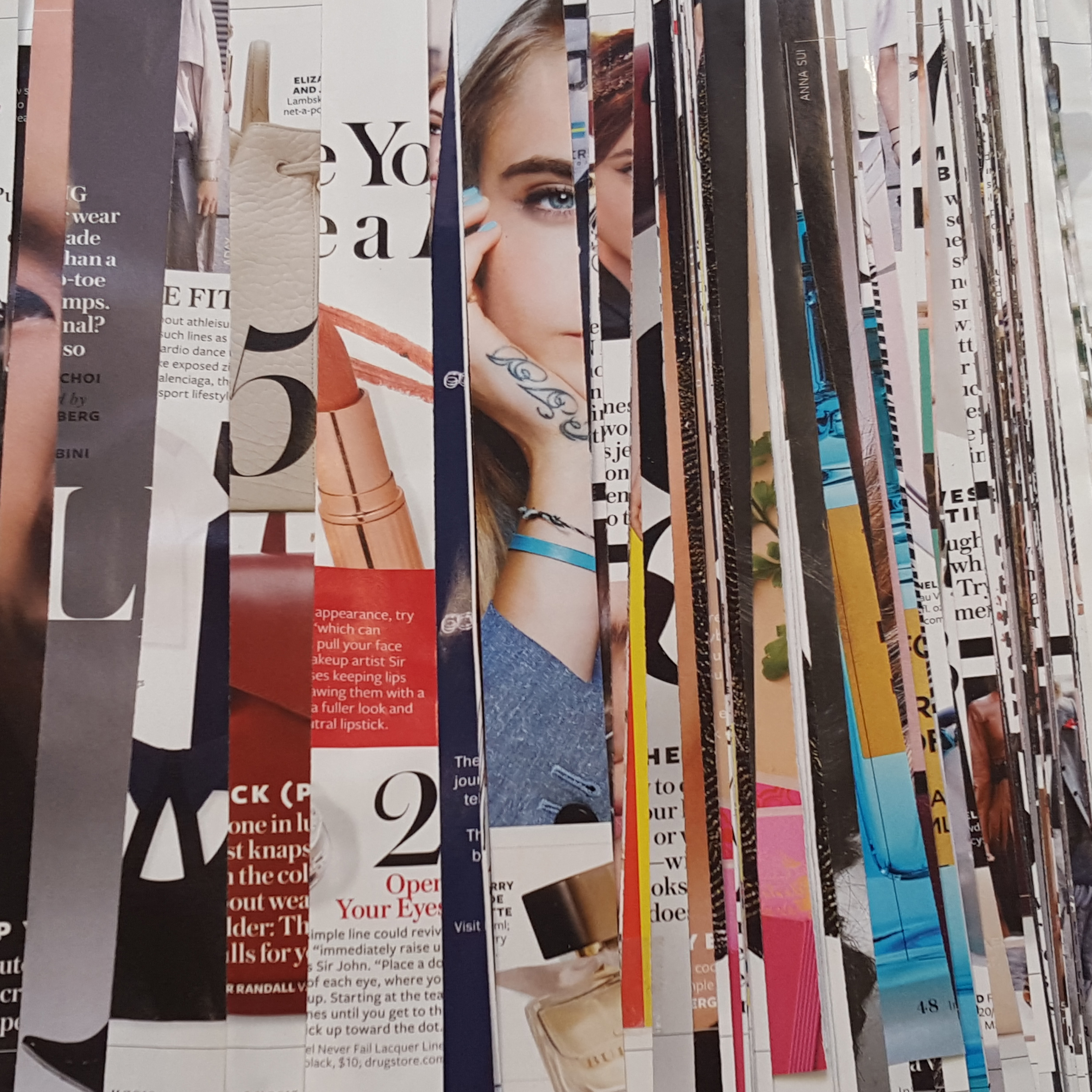 Magazine pages cut into strips.