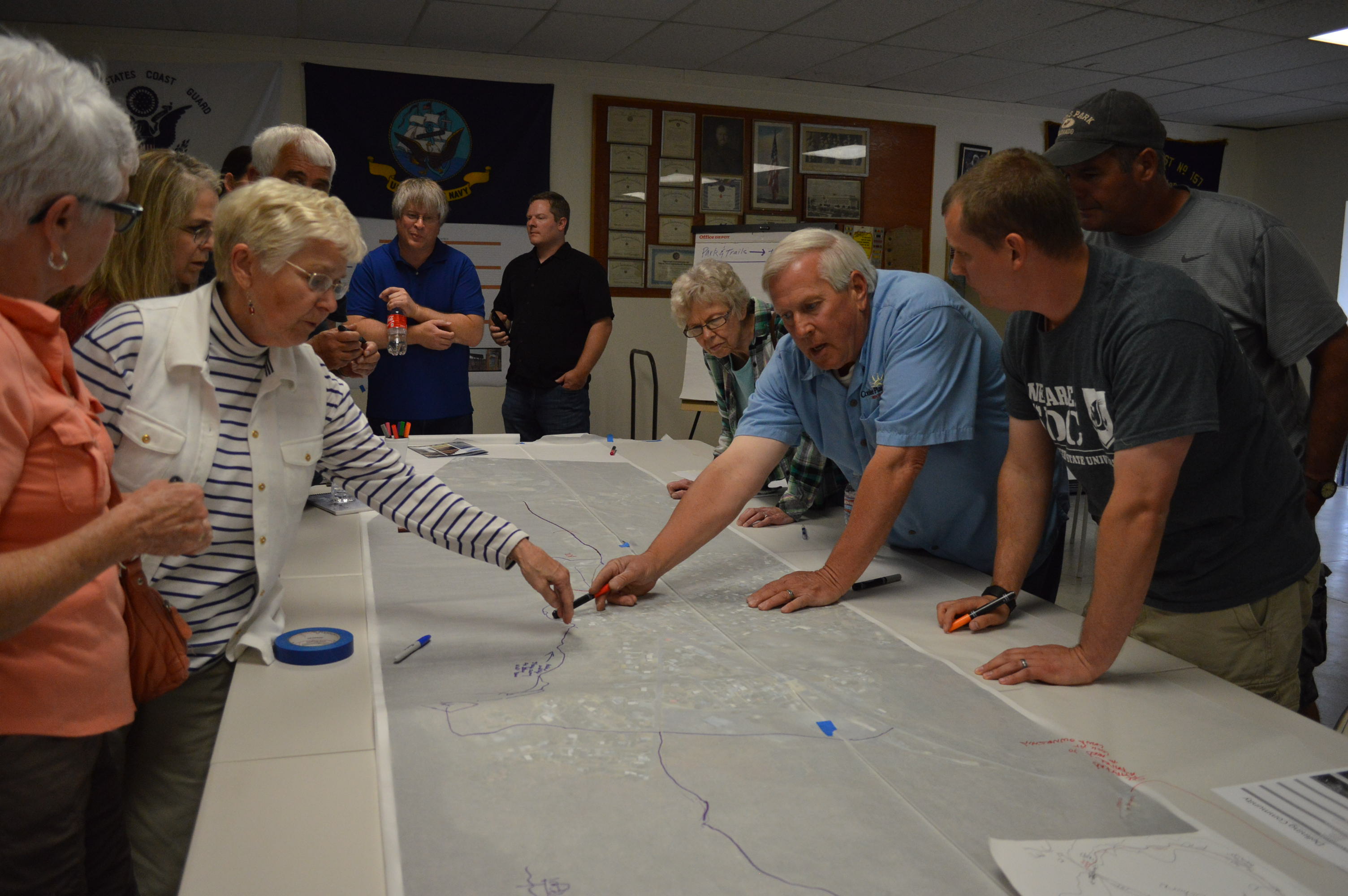 Students discuss the design of a lakeside trail system, parks and sidewalks for Electric City