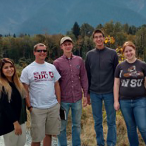 Students in front of White Horse Mountain. From left to right: Chucky Vallejo, architecture; Tyler Reid, Collin Schweikl, Philip VanDevanter, landscape architecture; Taylor Lynch, architecture.
