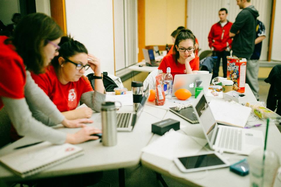 Students collaborating during a hackathon.