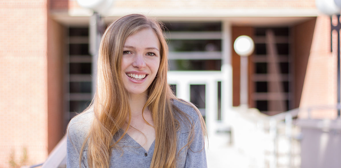 Mary Ellen Martinsen standing in front of the Voiland College.