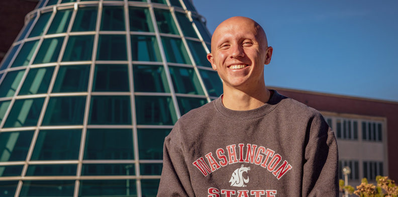 Kyler Little on the WSU Pullman Terrell Library Plaza.