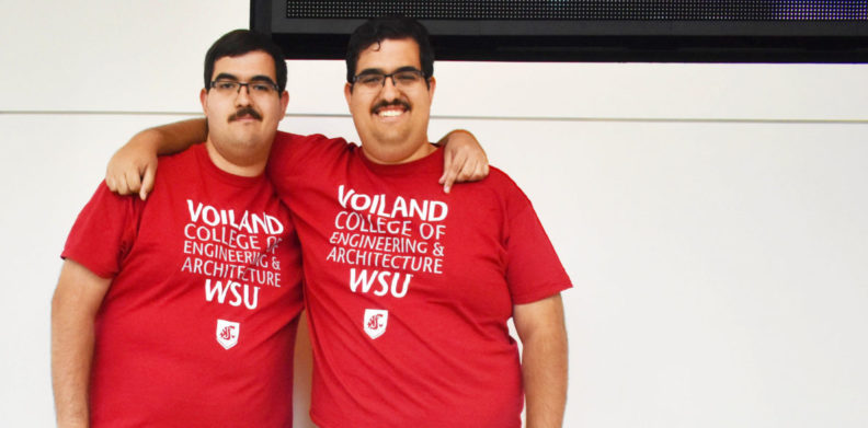 Joseph and Mario Guerrero standing side by side wearing Voiland College t-shirts.