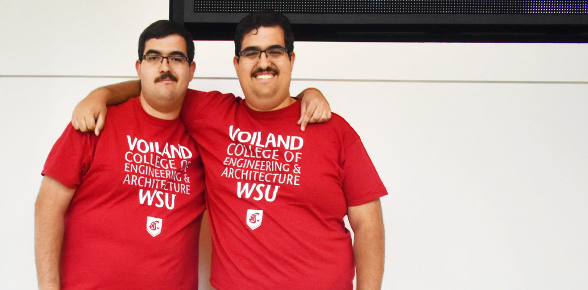 Joseph and Mario Guerrero standing side by side wearing Voiland College t-shirts.
