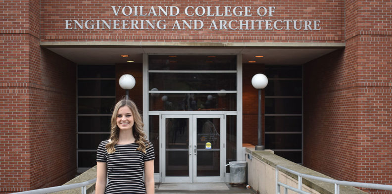 Madison Broers standing outside the Voiland College of Engineering and Architecture building.