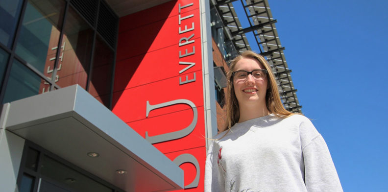 Haylie Murray standing outside a building on the WSU Everett campus.