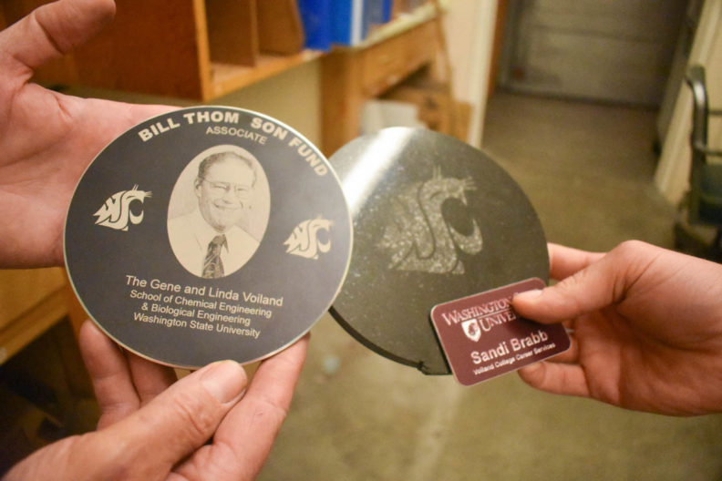 Engraved products of a name tag and coster.