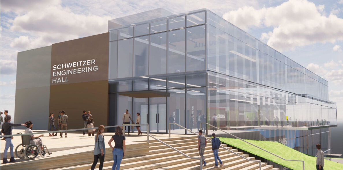 Multi-story building with floor-to-ceiling windows.
