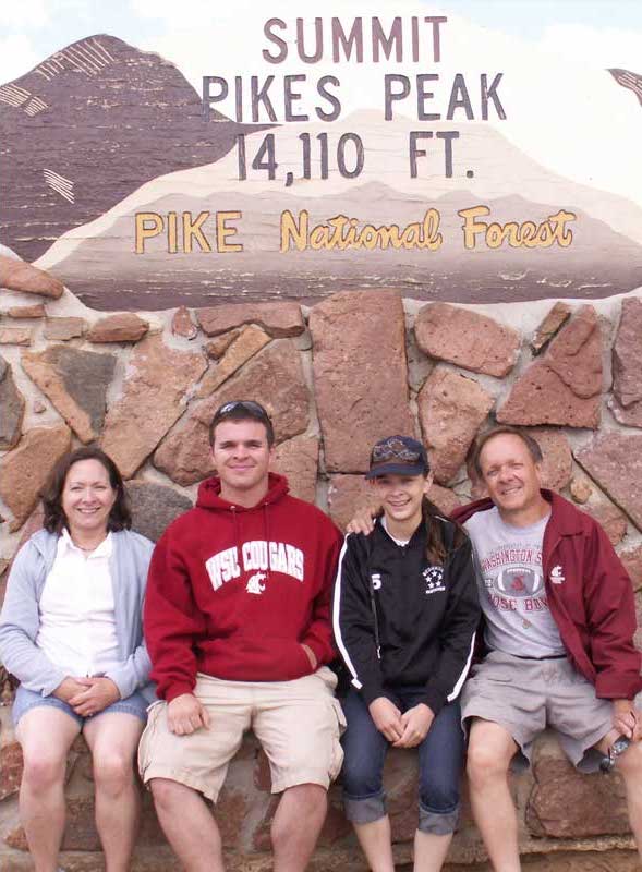 Ian Richardson with his family at the summit of Pikes Peak.