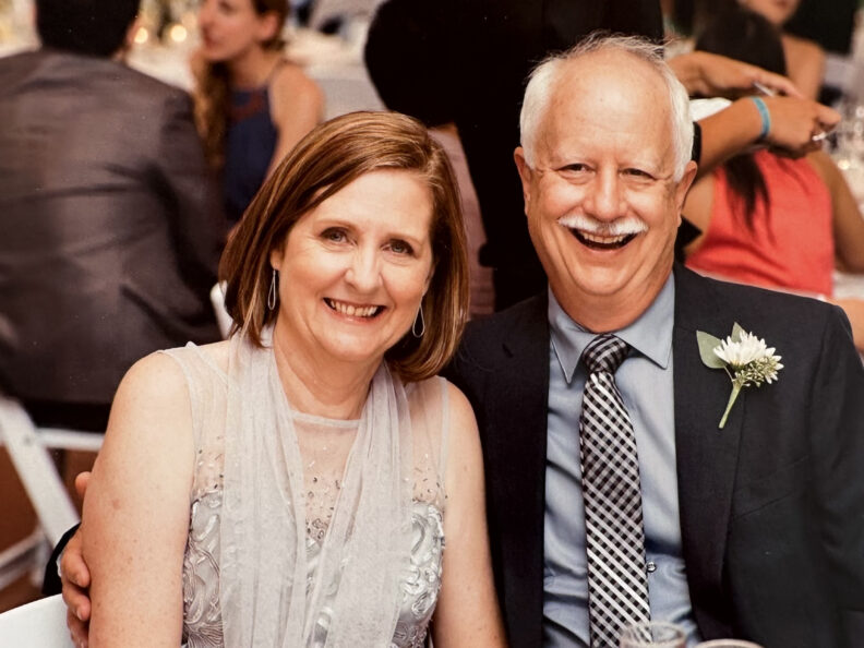 Jayne and Roy posing for a photo at an event.