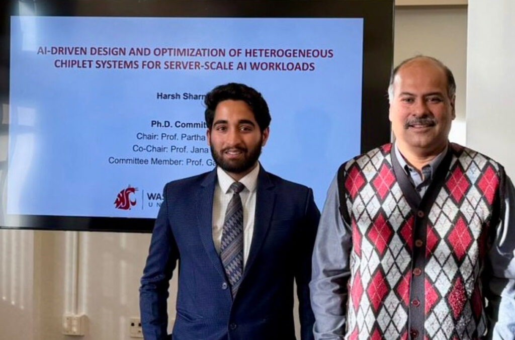 Closeup of Harsha Sharma and Professor Partha Pande.