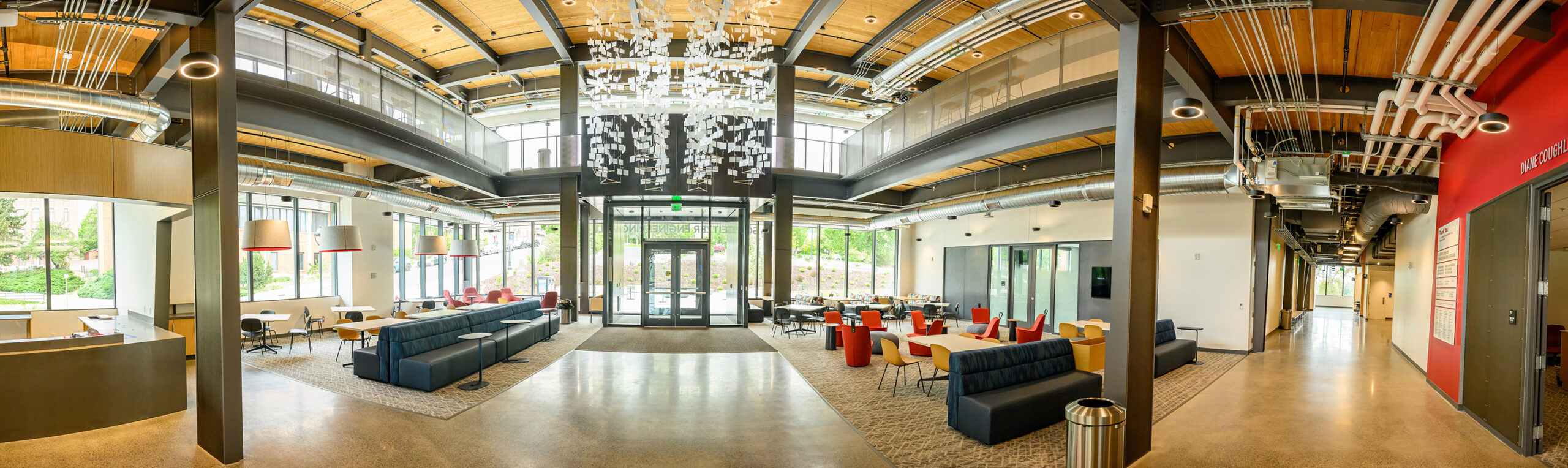 Panoramic view of a lobby with ceiling open to the second floor.