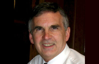 Headshot of James Holt.