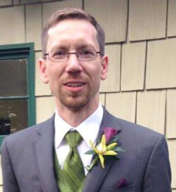 Headshot of Michael Harrold-Panell.