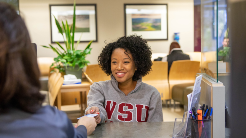 WSU student in a WSU hoodie.