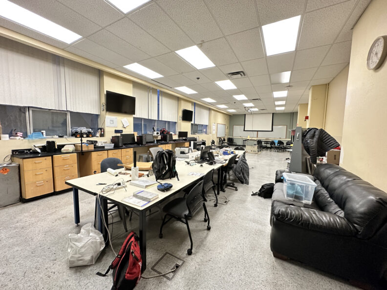 A row of tables in the community studio