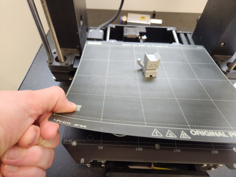 Picture of removing print from Prusa printer build plate