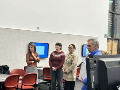 From left to right, Katie Morrissette, unknown, Patti DeVoe, and unknown at student research poster presentations
