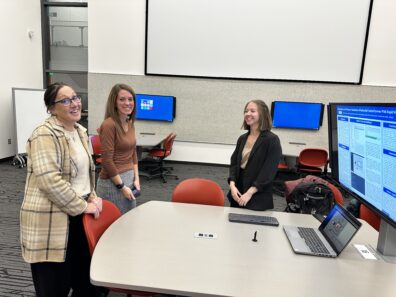 From left to right, Patti DeVoe, Katie Morrissette, and Katelyn Atkinson at student research poster presentation