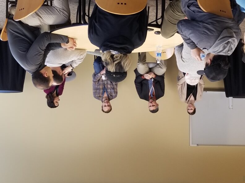 SEL employees discuss cybersecurity with CySER students.