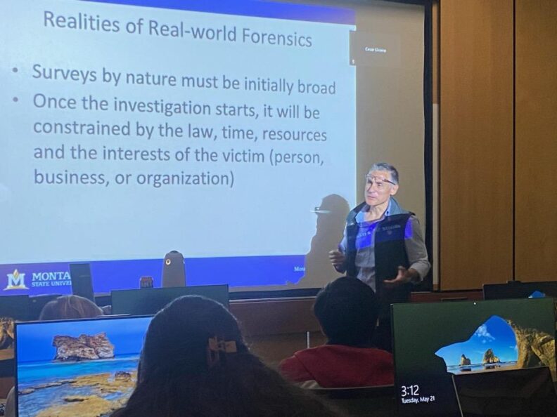 Dr. Clemente Izurieta explains digital forensics during the hands-on demonstration.