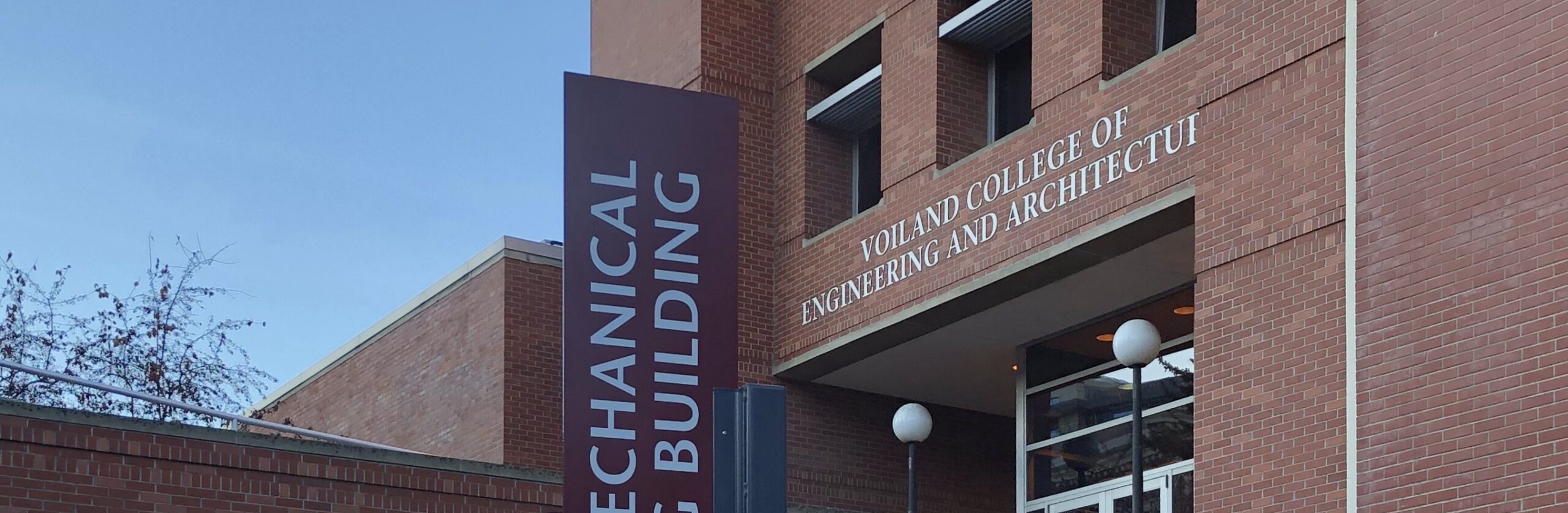 Brick building displaying the name Voiland College of Engineering and Architecture.