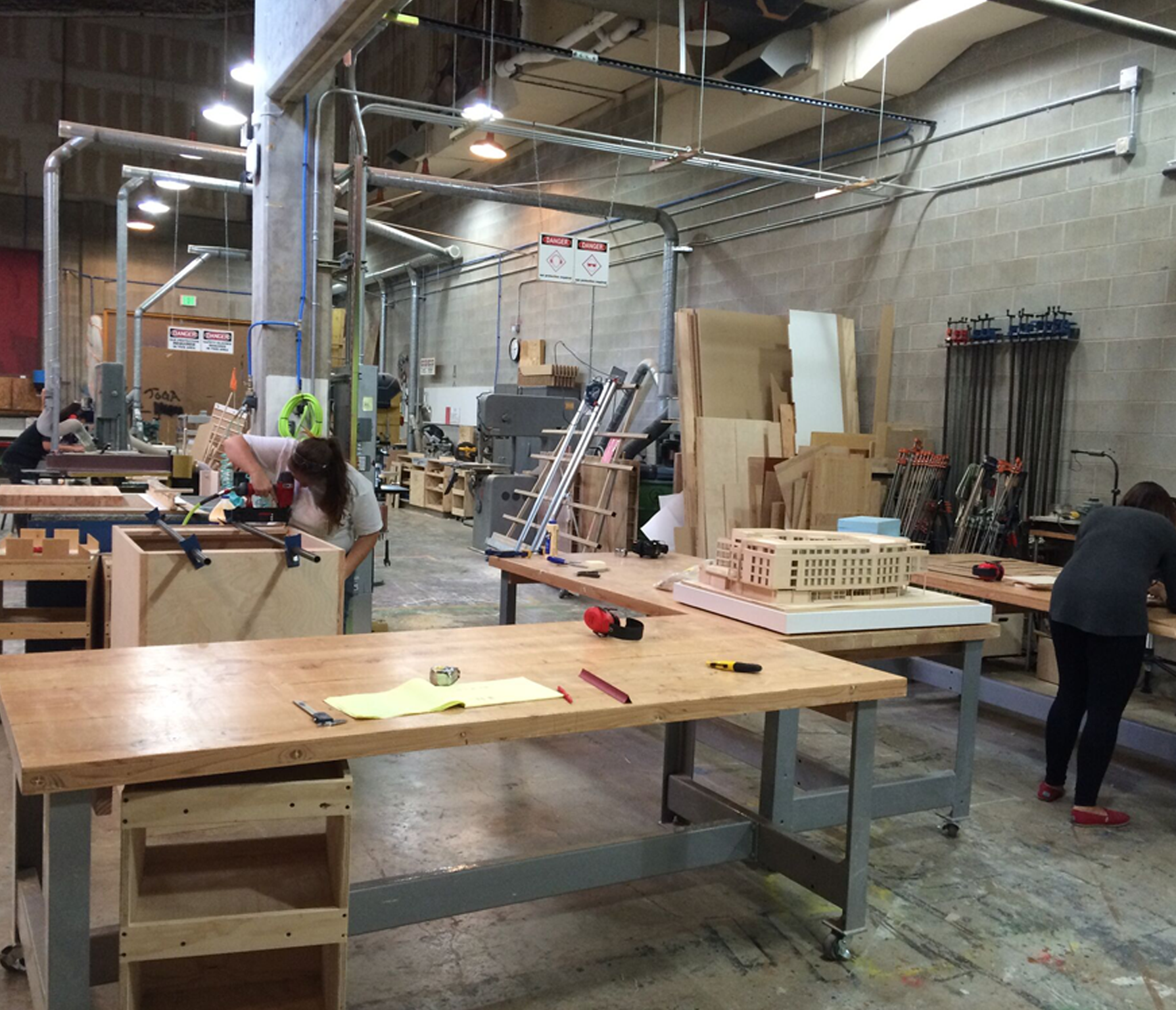 Students working on projects in the fabrication lab.