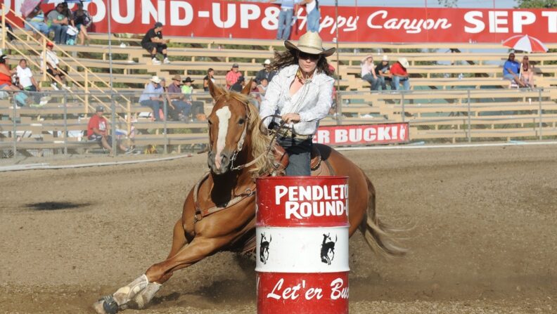 Jillian Connolly riding Sugar in a barrel race. Photo with permission by WT Bruce .