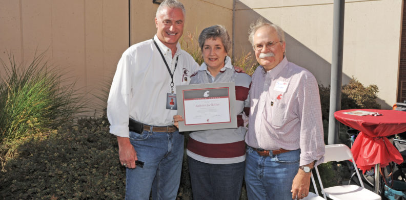 Kathy Slinker receiving certificate