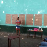 Maria Ortiz giving a presentation