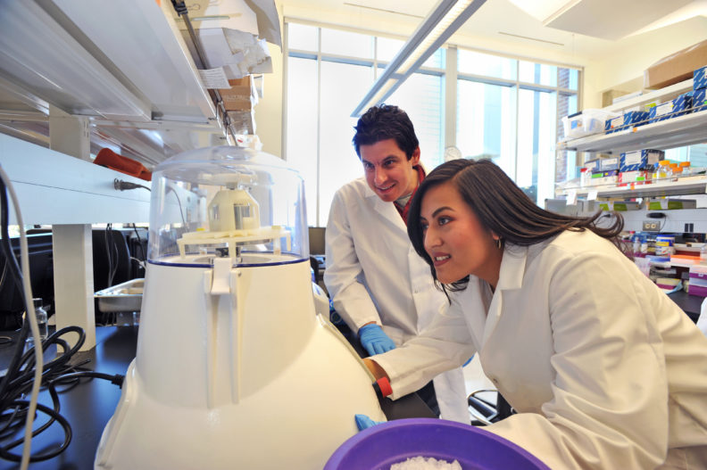 Dr. Goodman and Marena Guzman in Dr. Goodman's laboratory