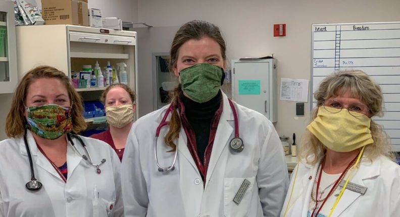 Wearing donated cloth masks