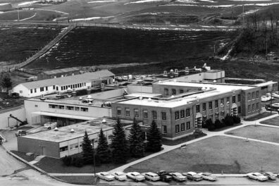 Aerial photo of McCoy Hall in 1961. Additions to the original building are the south, east and north.