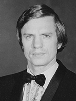 Black and white photo of Terrance while he was in college getting his DVM.