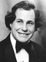 Black and white photo of Robert while he was in college getting his DVM.