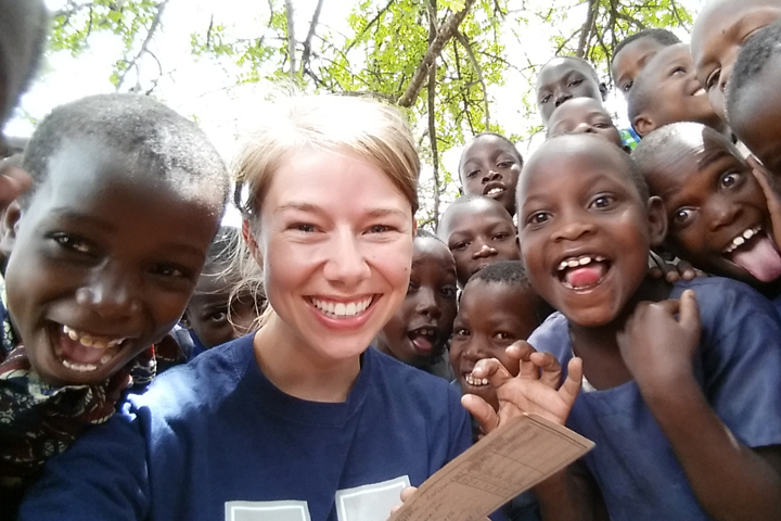 Veterinary student Cassie Eakins with Tanzanian children.
