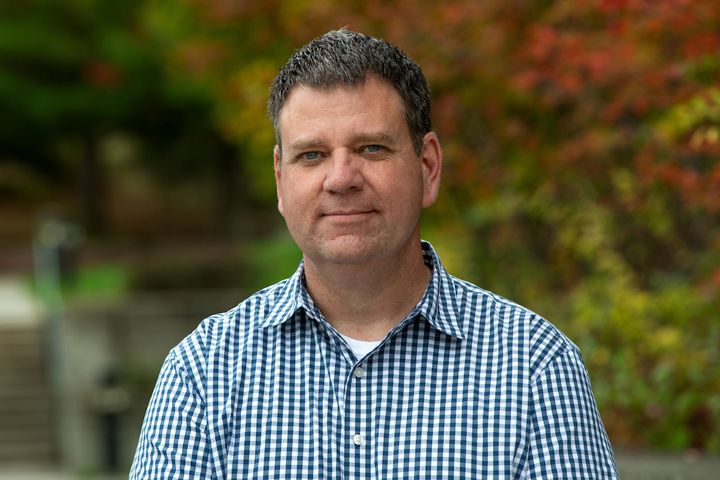 Dr. Thomas Waltzek, summer 2023, outside the College of Veterinary Medicine.