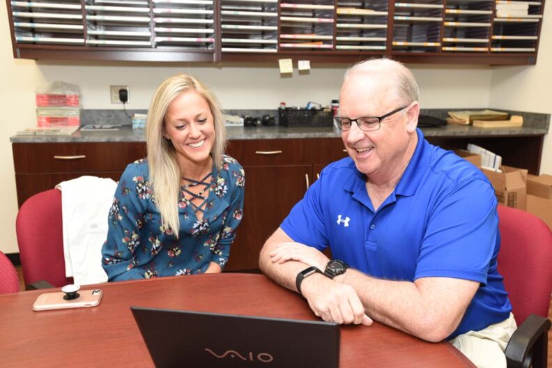 Emily Thueson with Rick DeBowes.