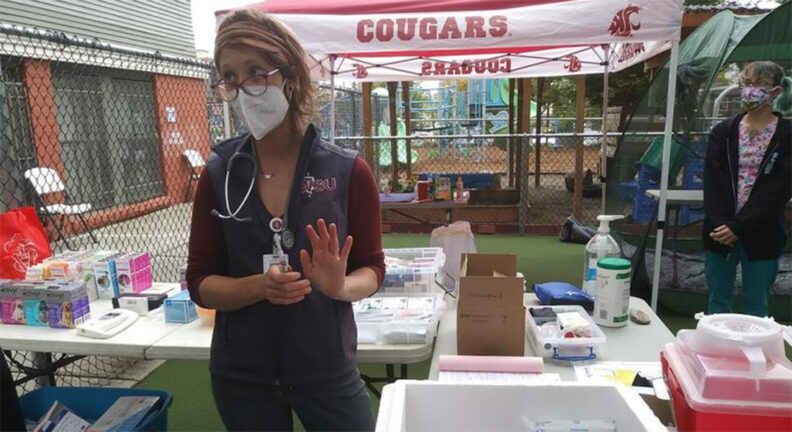 Dr. Katie Kuehl prepares to meet patients at the One Health Clinic in Seattle.