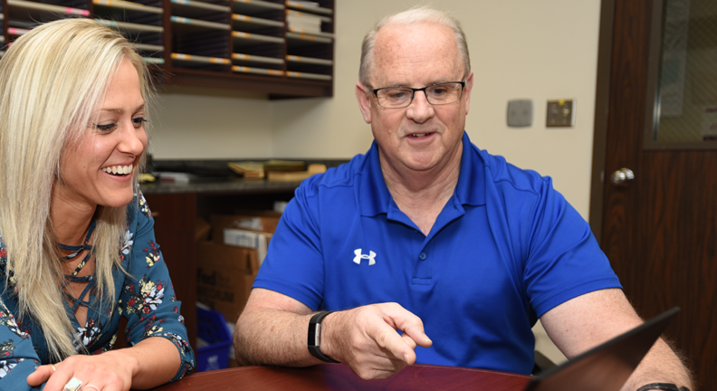 Emily Thueson with Rick DeBowes.
